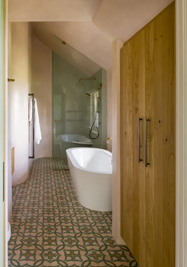 Bespoke bathroom storage behind beautiful oak doors