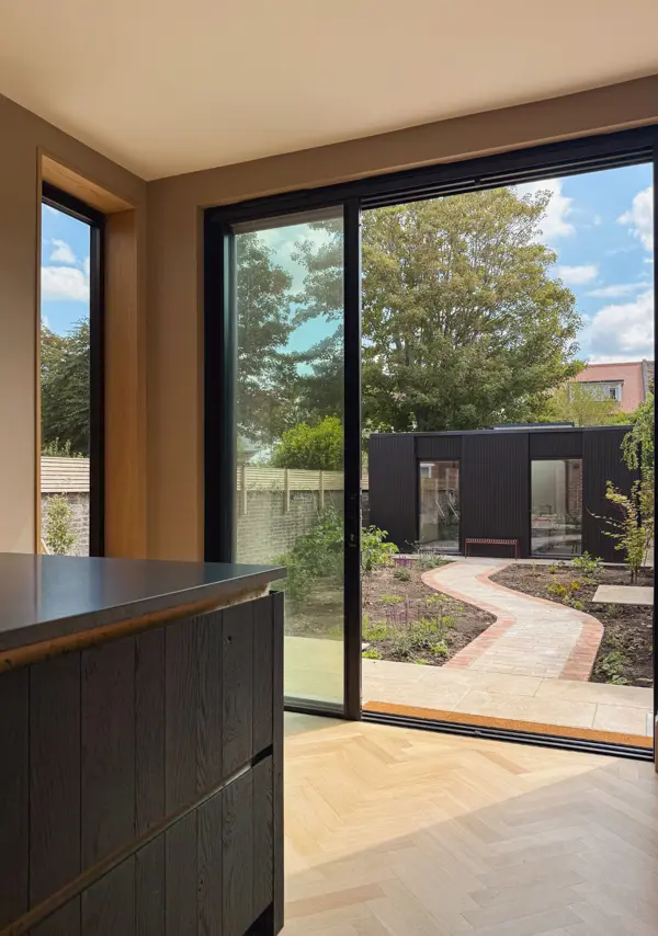 A blackened oak island designed to mirror the pottery studio