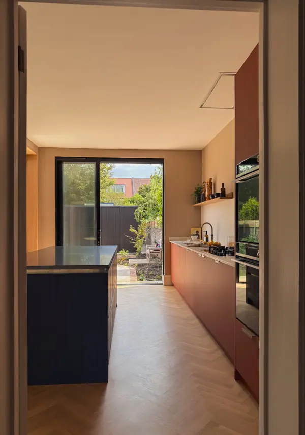 The kitchen island mirrors the pottery studio