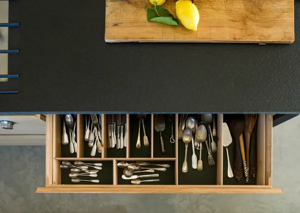 Our handmade cutlery drawers are layered with detail including Scottish milled broadcloth linings and configurable inserts to house everything from dainty cake forks to large BBQ skewers.