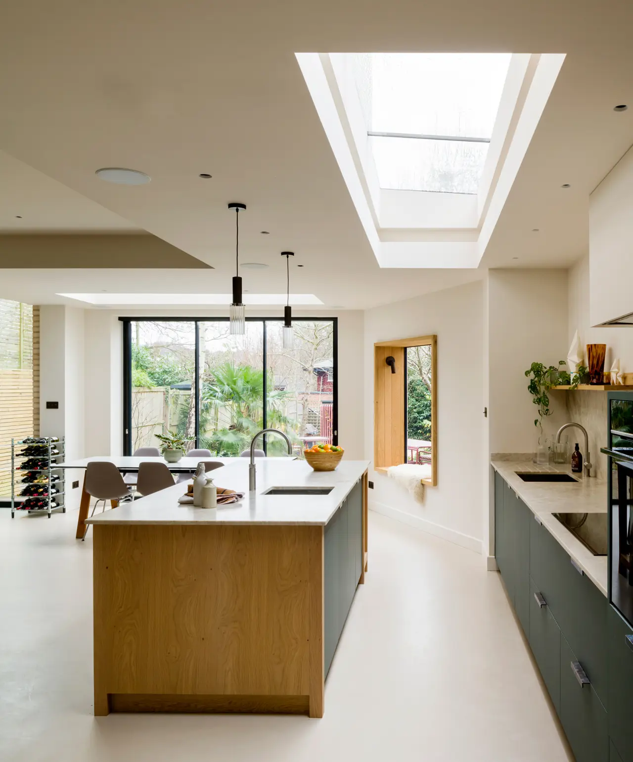 A well placed skylight brings more light into the prep, cook, clean zones of this modern kitchen – considered design that elevates the everyday.