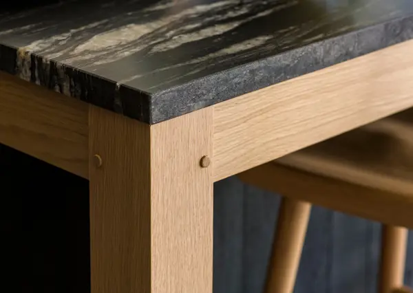 Detail of our kitchen Island with a pegged mortice and tenon construction in a solid oak frame, paired with contemporary cabinetry.